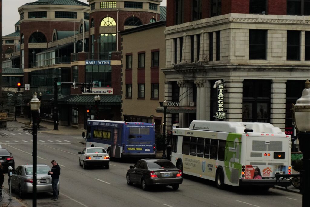 Lextran bus downtown with advertisement examples